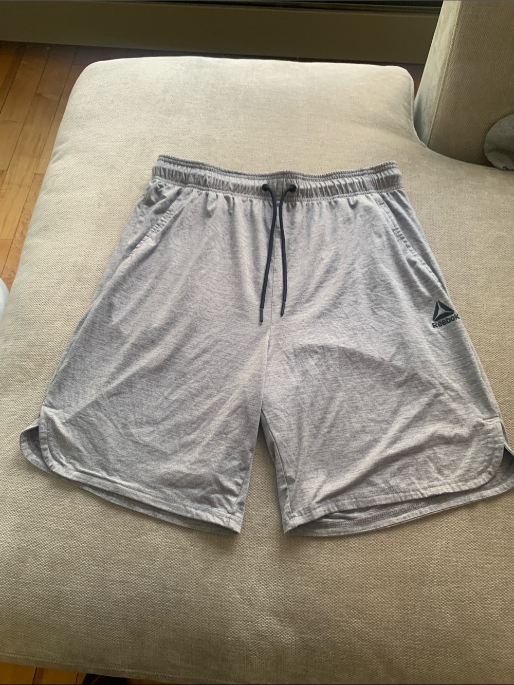 Reebok Men’s Light Gray Athletic Shorts with Black Drawstring